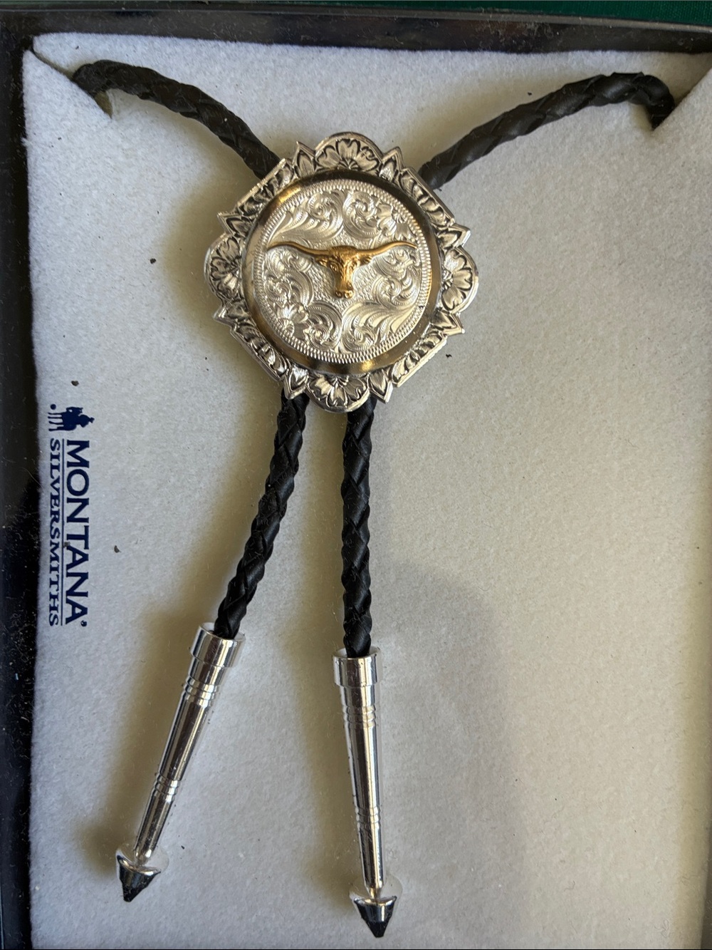 Montana Silversmiths Silver and Gold Longhorn Concho Bolo Tie with Black Cord